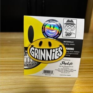 Ron English collectible propaganda buttons grinnies and have a grin day